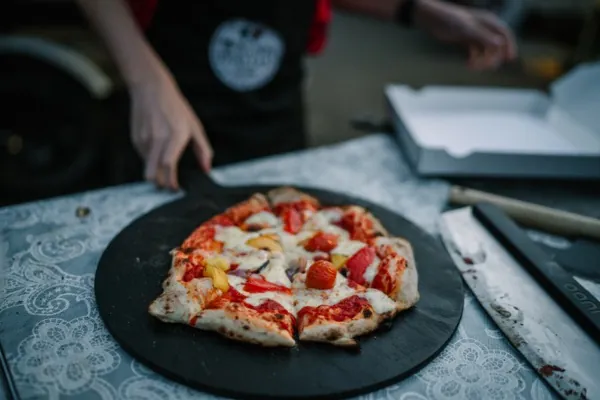Beautiful pizza topped with fresh vegetables